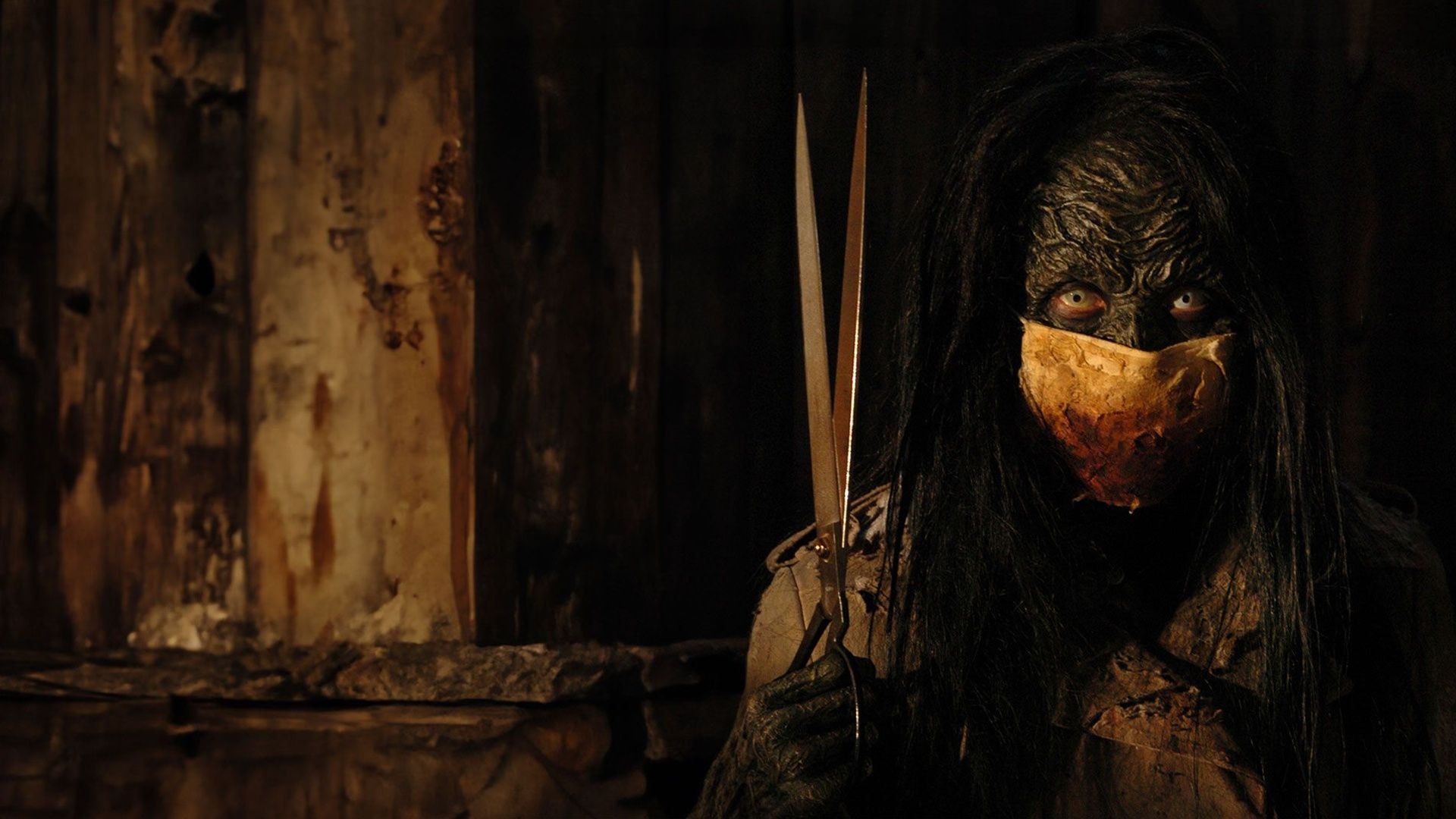 Carved: The Slit-Mouthed Woman