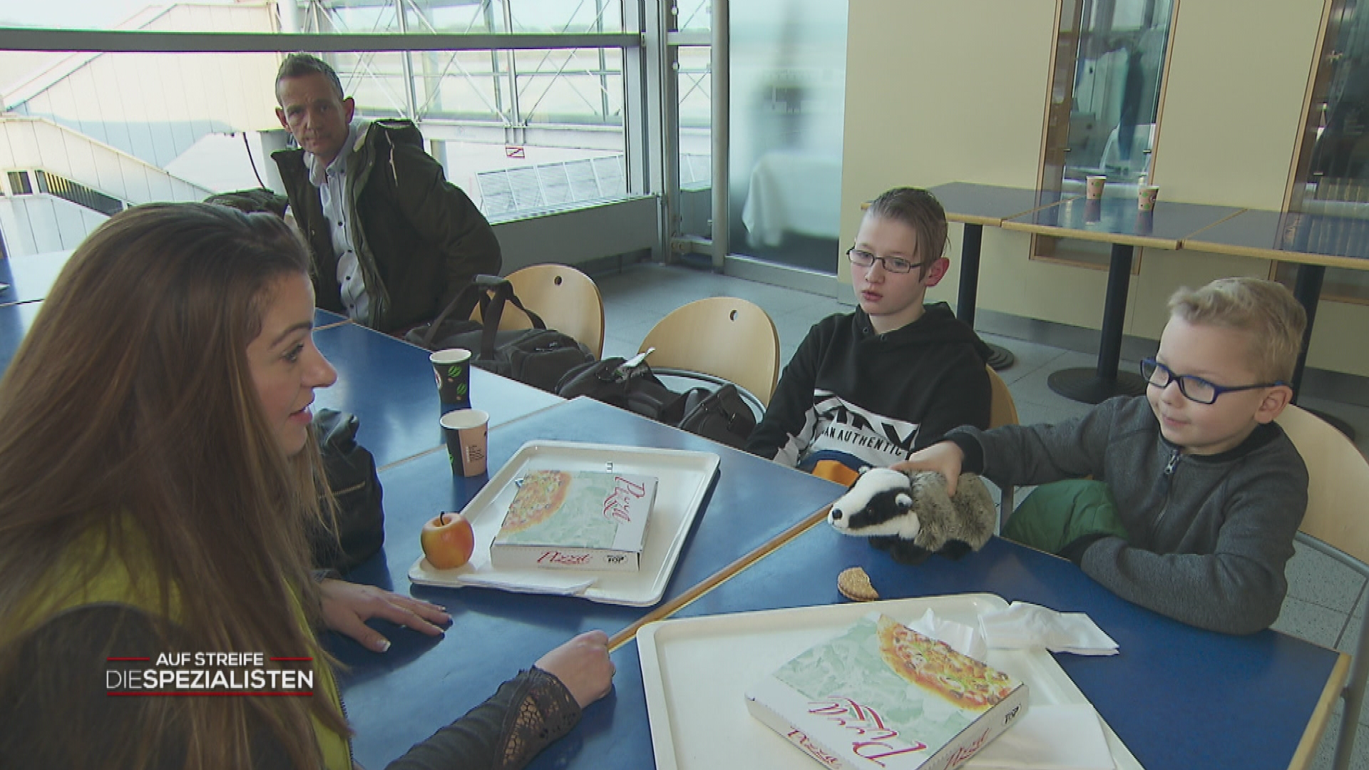 Die Schlange am Flughafen