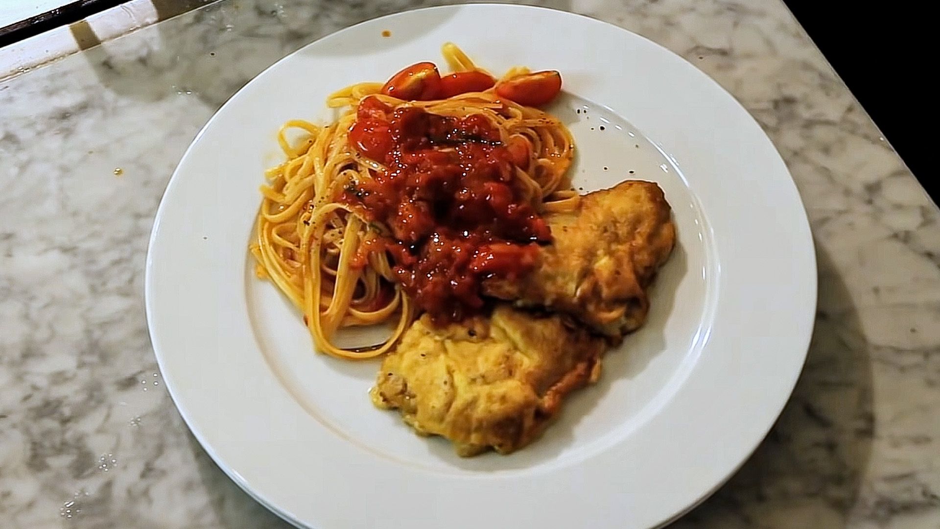 Piccata Milanese mit Tomatenspaghetti