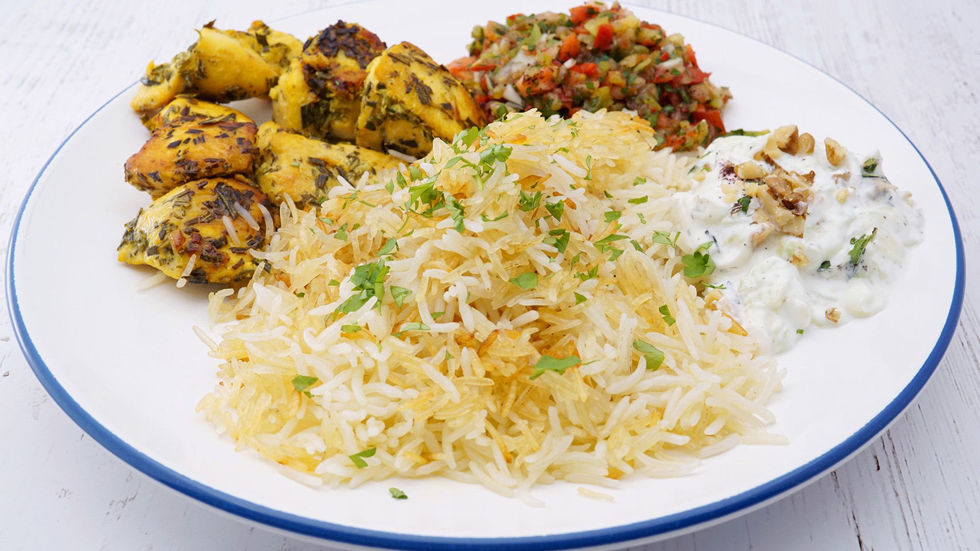 Safran-Huhn mit Tahdig, Ezme und Cacik
