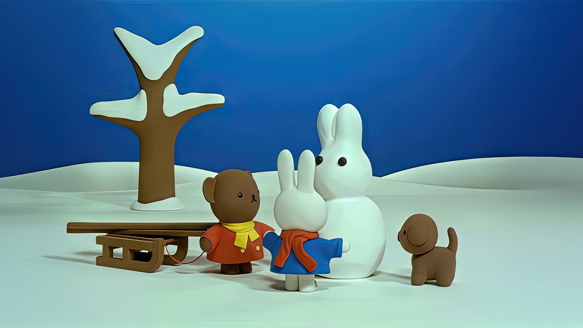 Miffy baut einen Schneehasen