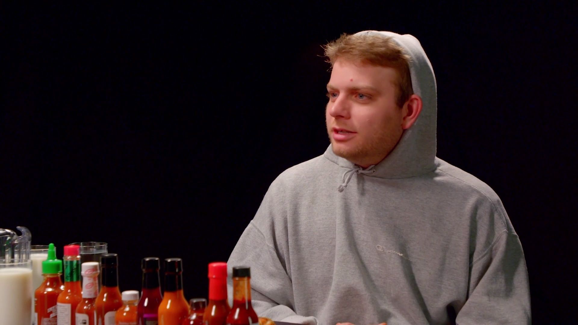 Mac DeMarco Tries to Stay Chill While Eating Spicy Wings