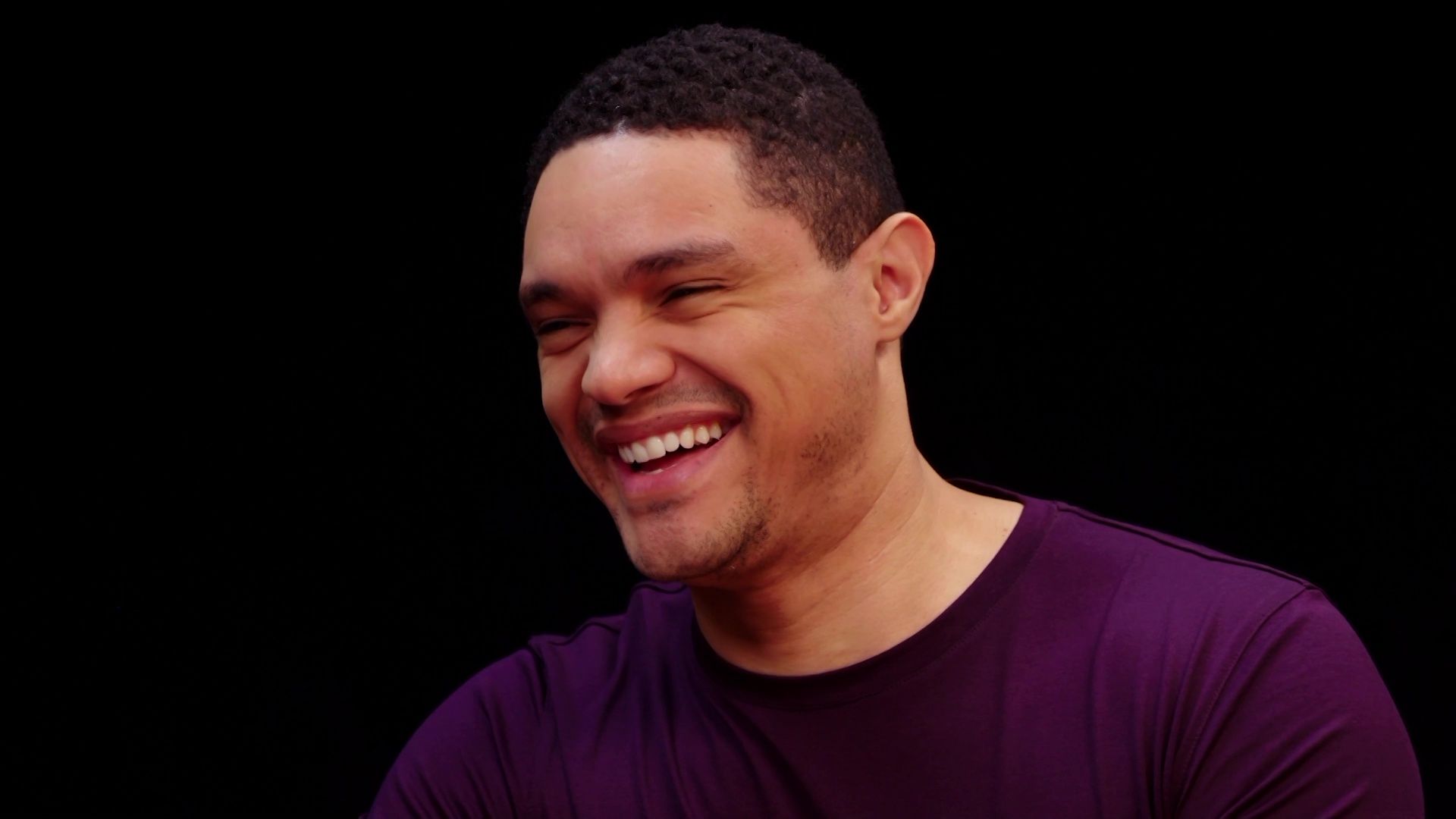 Trevor Noah Rides a Pain Rollercoaster While Eating Spicy Wings
