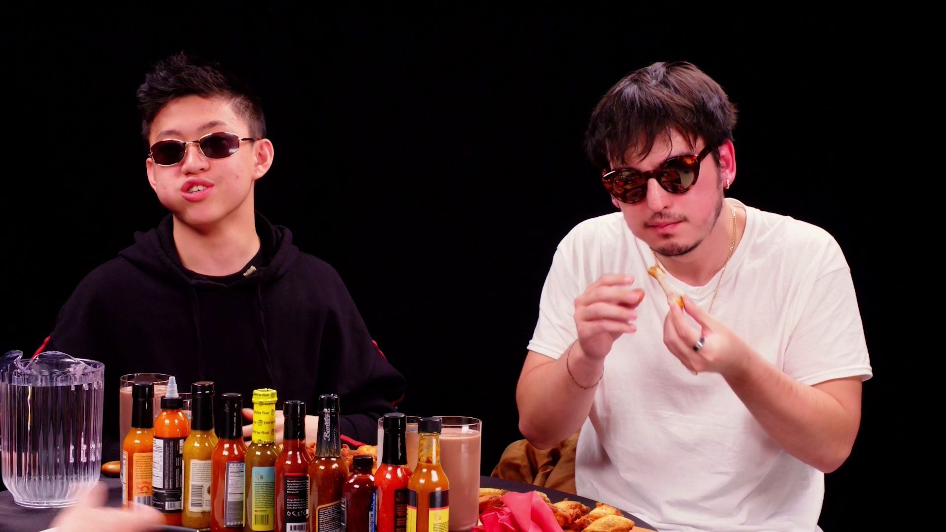 Joji and Rich Brian Play the Newlywed Game While Eating Spicy Wings