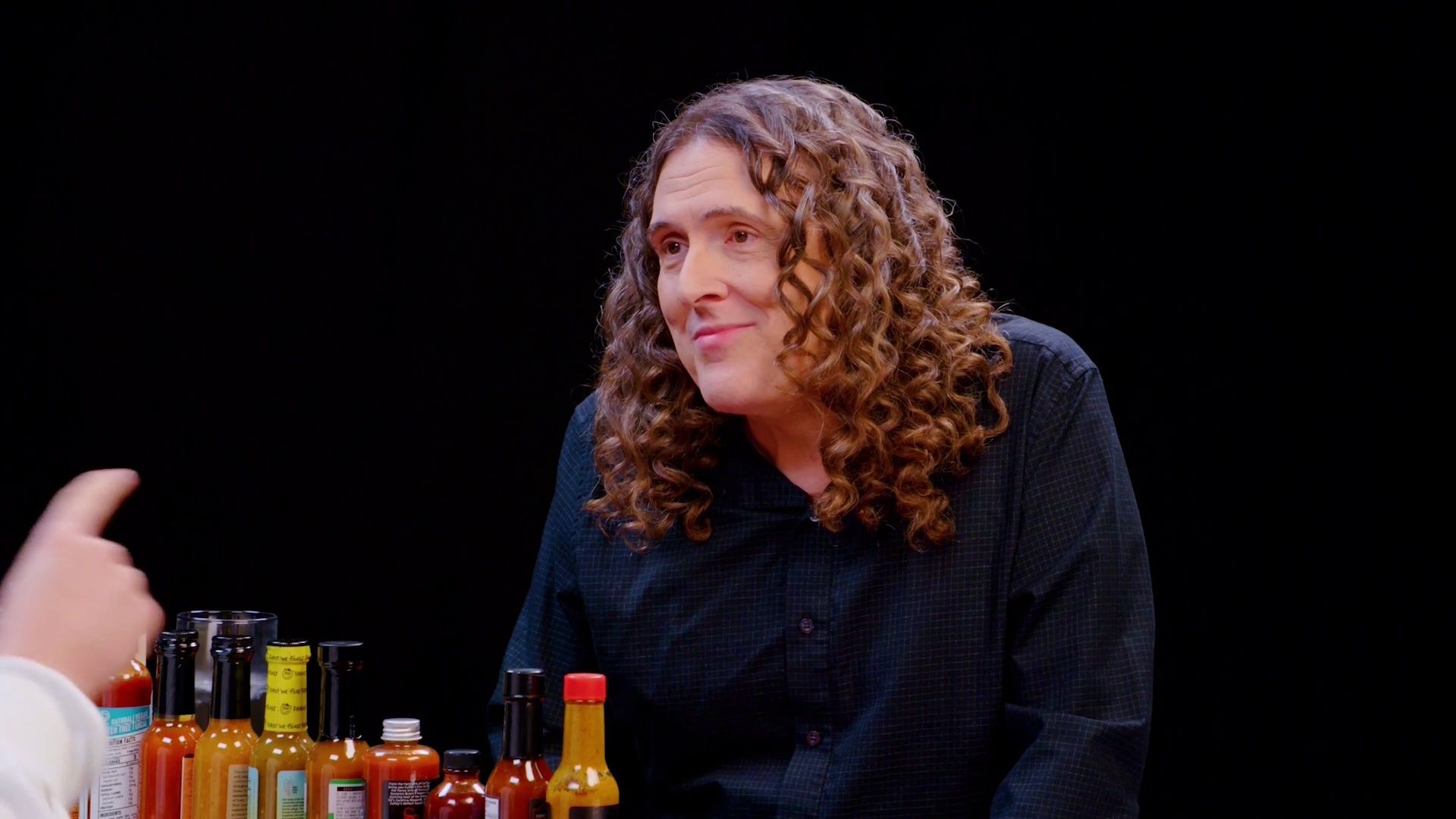 Weird Al Yankovic Goes Beyond Insanity While Eating Spicy Wings