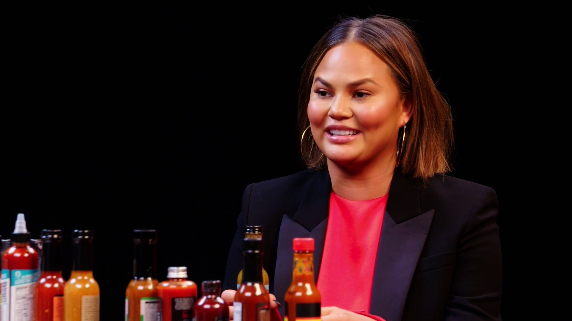 Chrissy Teigen Gets Drunk on Spicy Wings