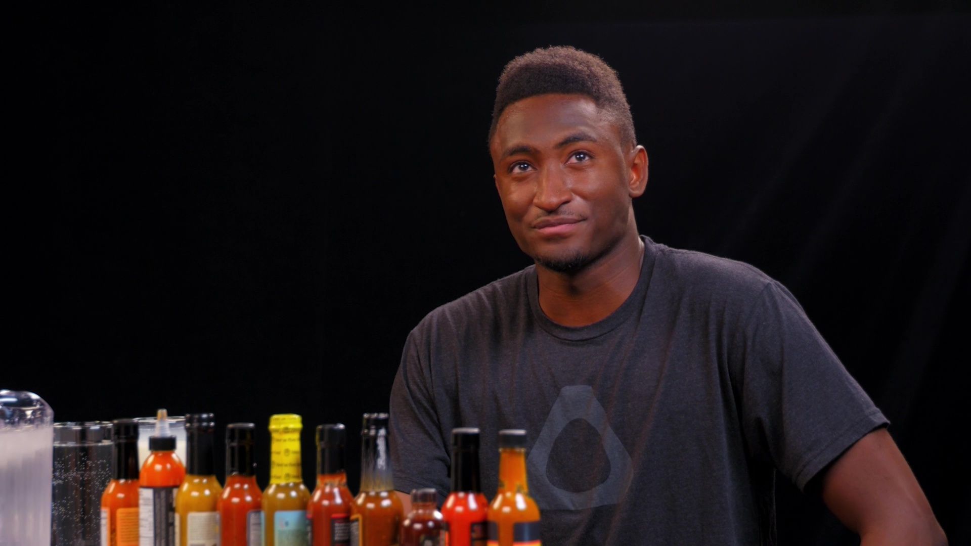 Marques Brownlee Ranks Hot Sauce Labels While Eating Spicy Wings