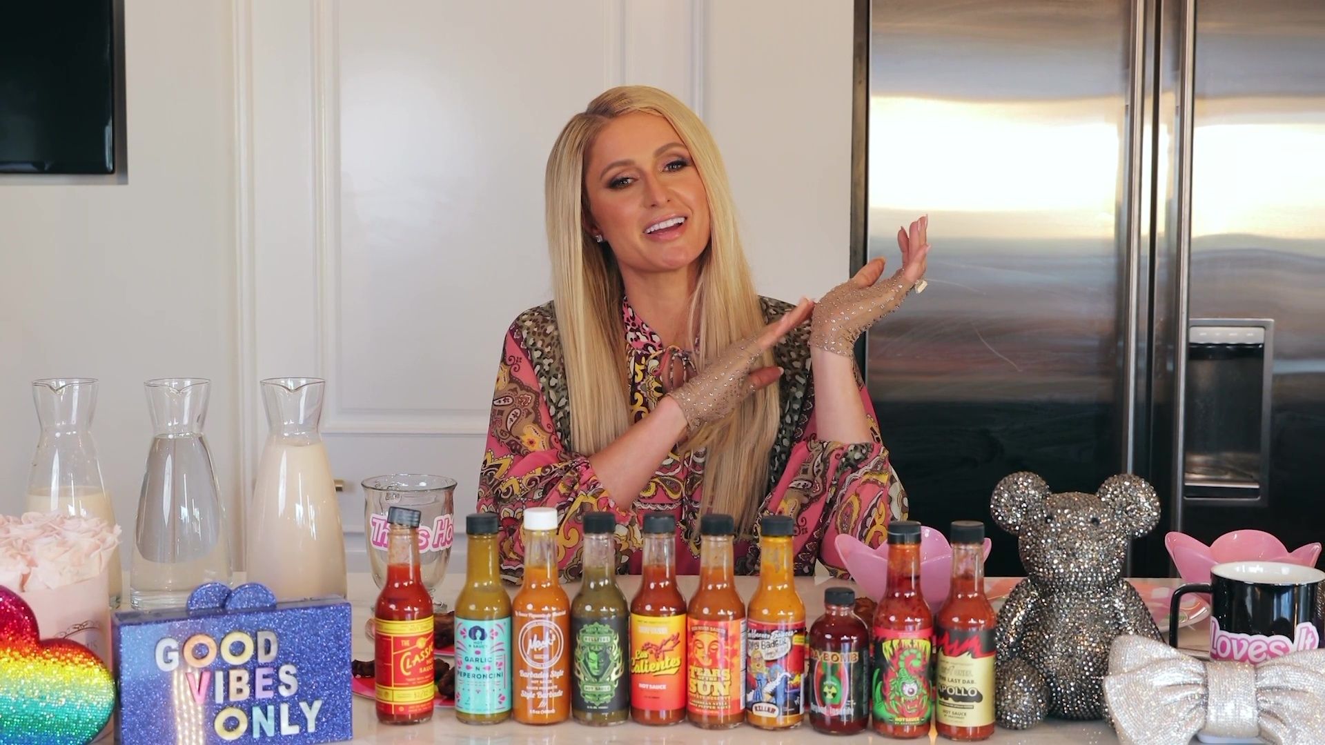 Paris Hilton Says "That's Hot" While Eating Spicy Wings