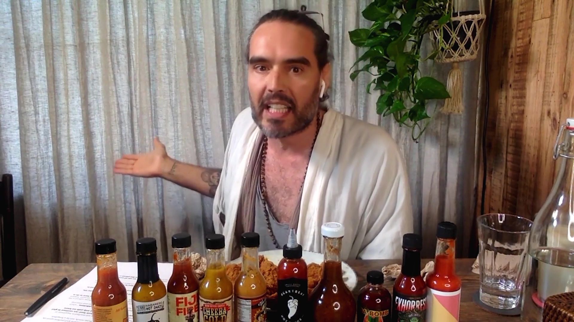 Russell Brand Serenades Superfan Brett Baker While Eating Spicy Wings